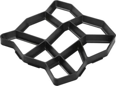 A black plastic mold for creating paving stones.