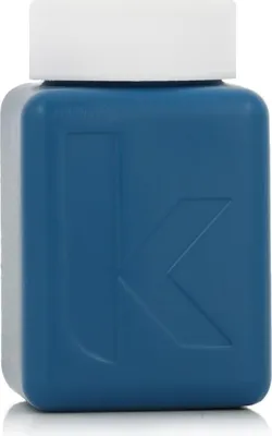 A close-up studio shot of a small, square blue bottle with a white cap.