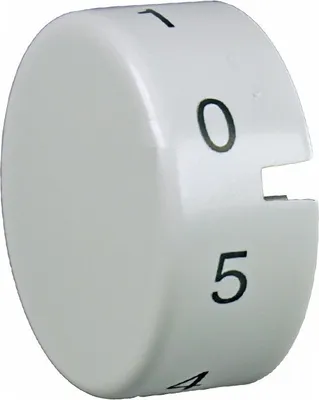 A white dial with numbers printed on it, showing a zero, one, four, and five.
