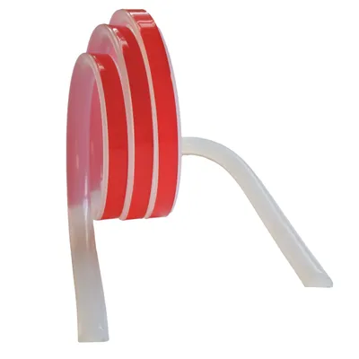 A close-up side view of a silicone shower threshold with red and white stripes.