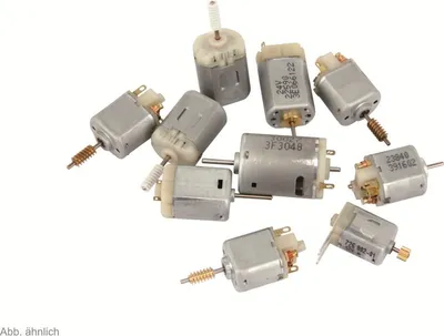 A collection of small DC motors with gears, arranged on a white background.