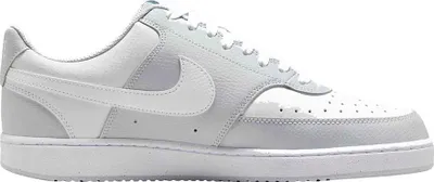 A side view of a single Nike Court Vision sneaker.