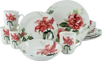 A collection of dinnerware with a floral pattern.
