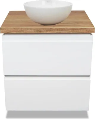 A white bowl sits on top of a wooden countertop, which is placed on a white cabinet with two drawers.