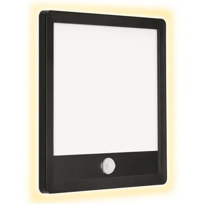 A black LED outdoor wall lamp with a motion sensor is shown against a white background. A soft yellow glow emanates from the sides of the lamp.