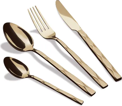 A set of four gold-colored cutlery items arranged diagonally on a white background.