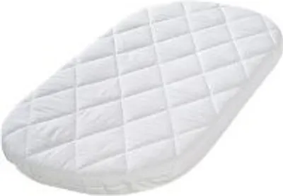 A white quilted mattress with a diamond pattern.