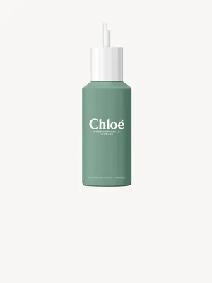 A product shot of a green perfume bottle with a white cap and applicator.