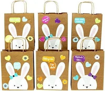 Produktbild von Papierdrachen XXL Geschenktüten für Kinder zu Ostern - Osterdeko - Kreatives Osternest mit 6 Papiertüten und süßem Hasengesicht - Set Nummer 1