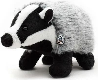 A plush toy badger is shown from a side-angle on a white background.