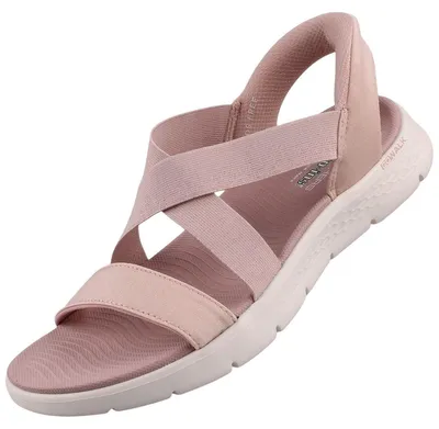 Auf dem Bild ist eine rosa Sandale abgebildet die auf der linken Seite zu sehen ist. Die Sandale hat ein schlichtes Design mit einem Riemen über dem Fuß und einer strapazierfähigen Sohle.