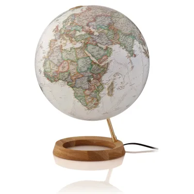 A globe on a wooden stand, isolated on a white background.