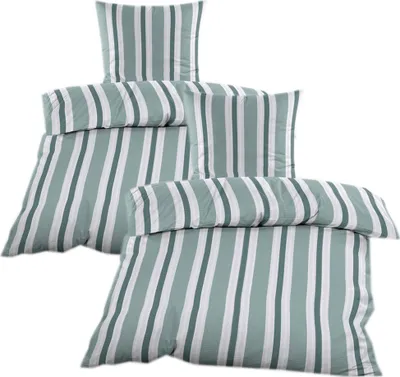 A set of striped bedding items arranged in a layered display.