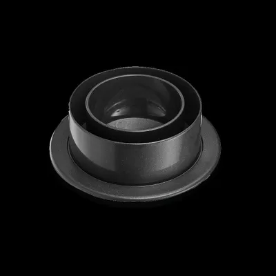 A black adapter for a Sodastream glass carafe is shown against a black background.