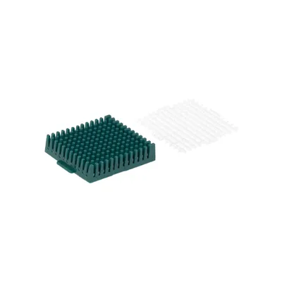 A green square cutting insert with many small spikes is shown next to a white, grid-like object on a white background.
