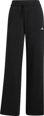 A pair of black Adidas pants shown front-on against a white background.