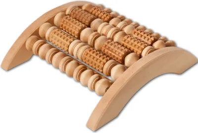 A wooden foot massage roller on a white background.