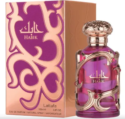 A perfume bottle and its packaging are displayed against a white background.