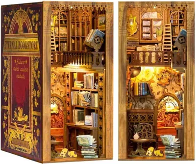 A diorama of a miniature bookstore inside a book-shaped casing, shown from two different angles.
