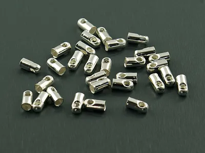Produktbild von Vintageparts 30 Endkappen silberfarben für 2 mm Bänder
