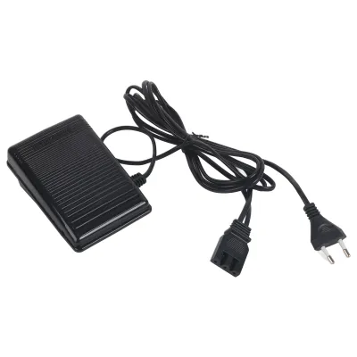A black foot pedal for a sewing machine with its power cord and plug.