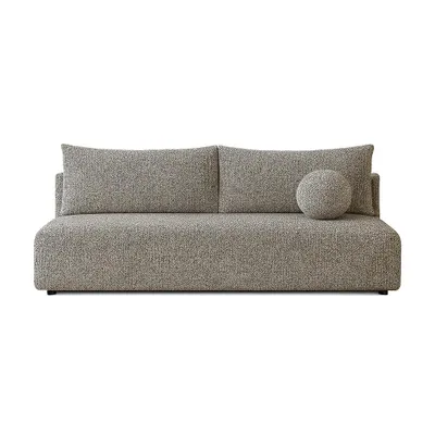 A studio shot of a sofa against a white background.