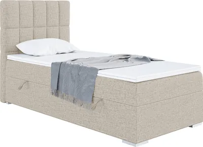 A single bed with a headboard, mattress, and topper, presented on a white background.