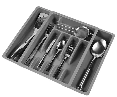 A gray cutlery organizer filled with various utensils, shown from a slightly elevated diagonal angle.