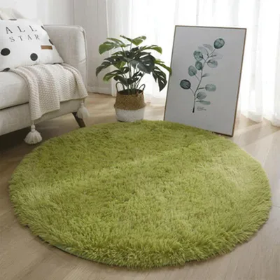 Zdjęcie produktu dla Miękki, okrągły dywan z wysokim włosiem, kolor zielony, średnica 80 cm