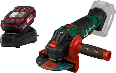 An angle grinder with a battery and charger.