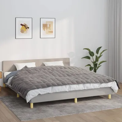 Imagen del producto de Manta ponderada gris de la marca The Living Store, de 155x220 cm y 7 kg de peso, con tejido de algodón