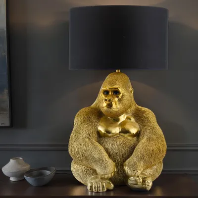 Produktbild von riess-ambiente Tischlampe KING APE 55cm gold schwarz Polyresin Stoffschirm Gorilla-Skulptur mit Kippschalter E27