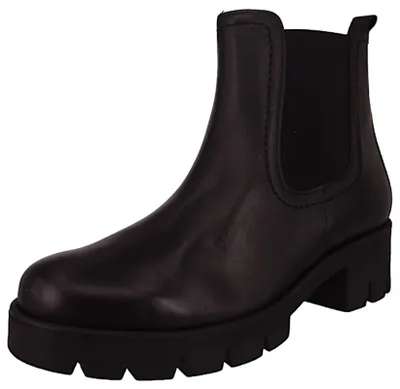 A black leather Chelsea boot with a thick sole is shown against a white background.