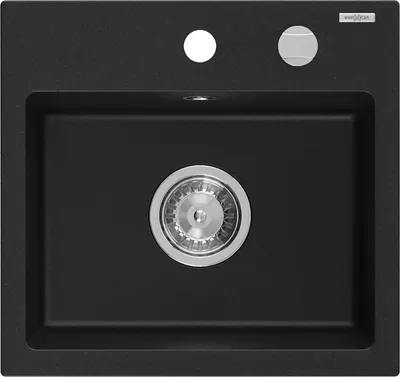 A black granite kitchen sink with a silver drain.