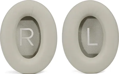 Two beige ear pads for headphones, each with a letter 'R' and 'L' indicating left and right.