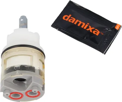 A ceramic cartridge and a small packet with the Damixa logo.