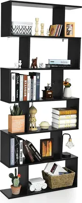 A black, multi-level shelf unit filled with various decorative items and books.