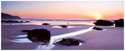 Produktbild von Wallario Premium Glasbild, freischwebende Optik, kräftige Farben, Größe 80 x 32 cm Motiv Sonnenuntergang am einsamen Strand