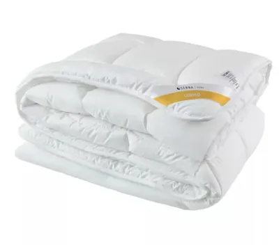 A folded white duvet is shown against a white background.