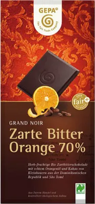 A chocolate bar wrapper with an image of a chocolate bar and an orange slice.