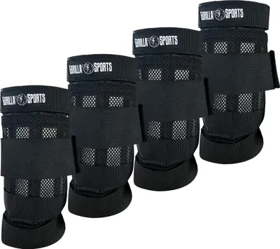 Four black weight cuffs are arranged diagonally on a white background.