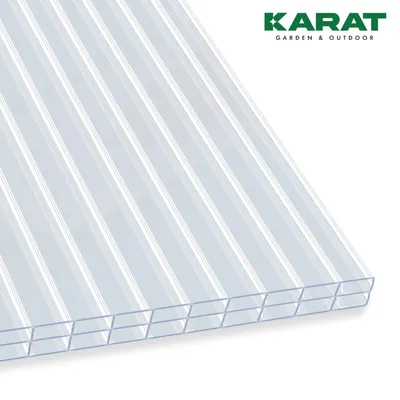 A close-up, angled view of a transparent polycarbonate sheet with a ribbed structure, set against a white background. The 'KARAT GARDEN & OUTDOOR' logo is visible in the top right corner.