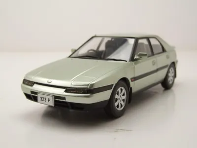 Produktbild von Whitebox 124259 Mazda 323 F RHD 1989 hellgrün metallic 1:24