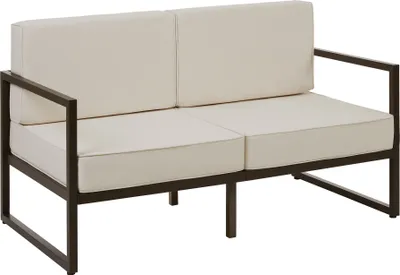 A studio shot of a two-seater outdoor sofa with cream cushions and a dark metal frame.