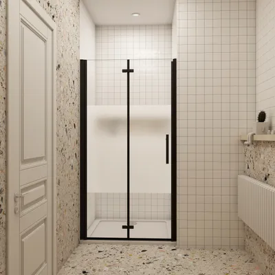 A modern bathroom interior featuring a glass shower enclosure.
