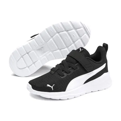 A pair of black and white Puma sneakers shown from a slightly elevated angle against a white background. One shoe is shown upright, and the other is shown upside down, revealing its sole.