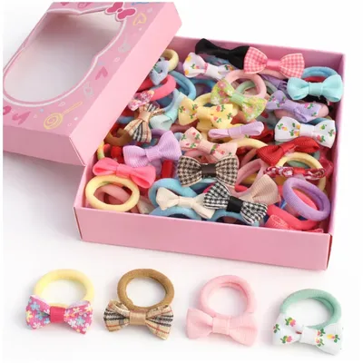 Produktbild von Set mit 50 bunten Haarbändern für Kinder in einer Box