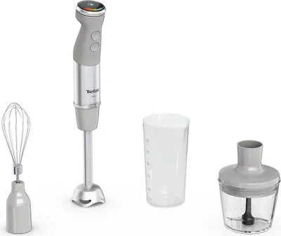 A set of kitchen appliances, including a hand blender, a whisk attachment, a measuring cup, and a chopper attachment, are displayed against a white background.
