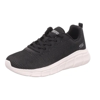 A single black sneaker with a white sole is shown against a white background.