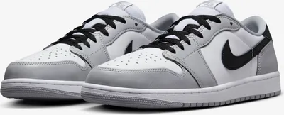 A pair of Nike Air Jordan 1 Low OG sneakers in a "Barons Wolf Grey White" colorway, presented against a plain white background.